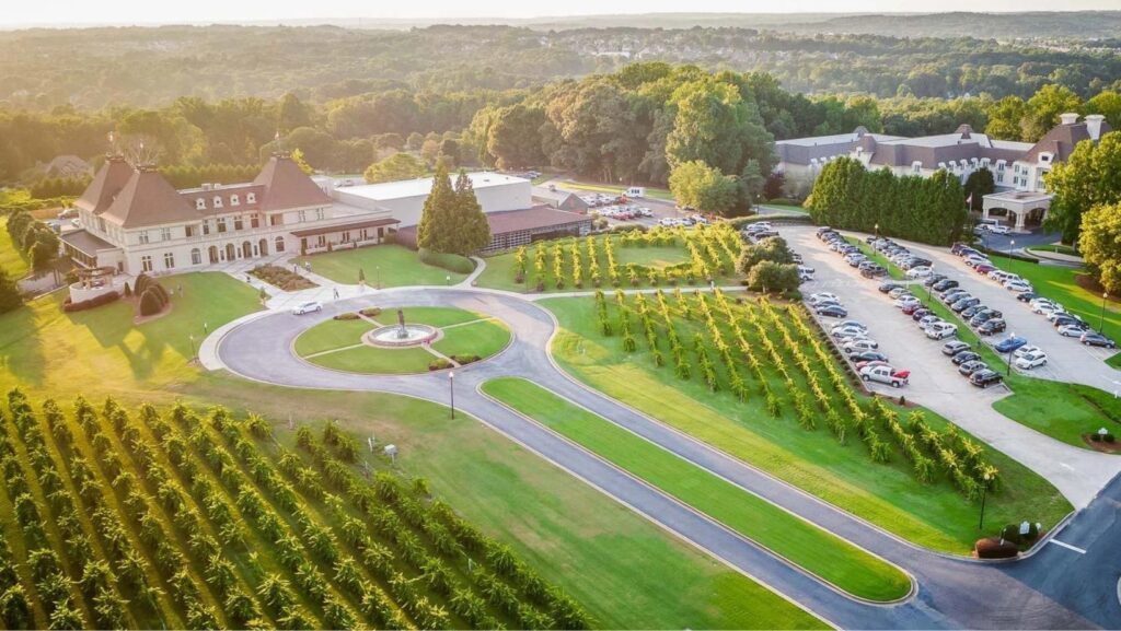 An overhead picture of a winery and a vineyard