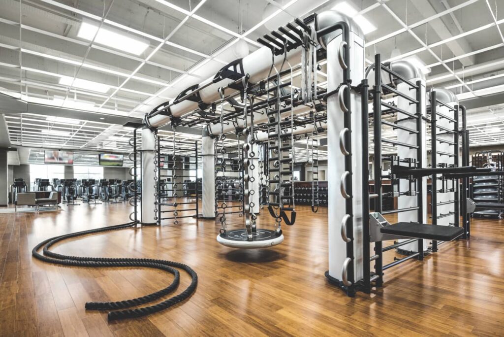 A picture of a luxury-style gym with multiple fitness equitment
