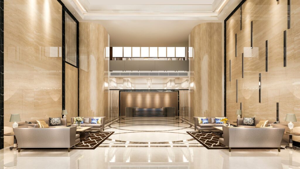 An image of a luxurious and high-end lobby, elegantly designed with polished marble floors and walls
