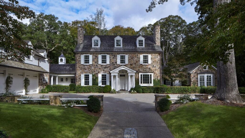A two-story modern luxury home with a White House appeal, blending sleek contemporary design with timeless elegance.