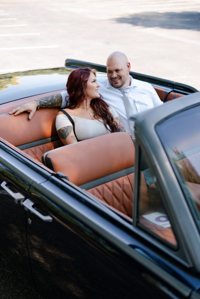 Founders Sam and Rich of Elite Customs inside a bespoke luxury convertible — a portrait of craftsmanship, style, and self-expression in motion.