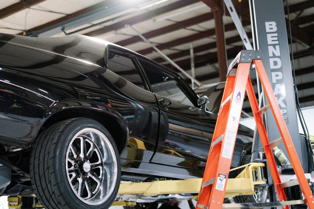 Detail shot of a restoration in progress at Elite Customs, capturing the precision of the build process.