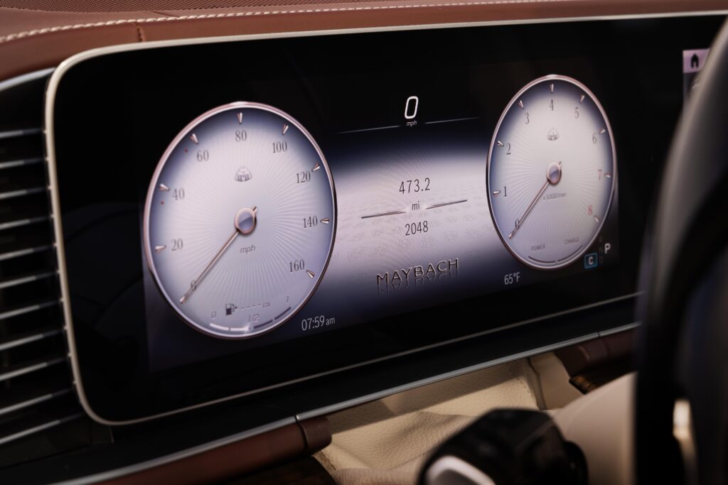 Digital instrument cluster displaying luxury performance dials.
