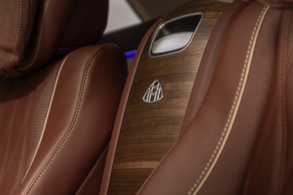 Leather seat with embossed Maybach logo on headrest.